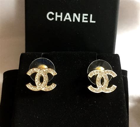 chanel earrings studs gold|authentic Chanel logo stud earrings.